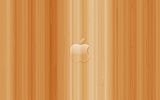 Apple HD logo on wood desktop