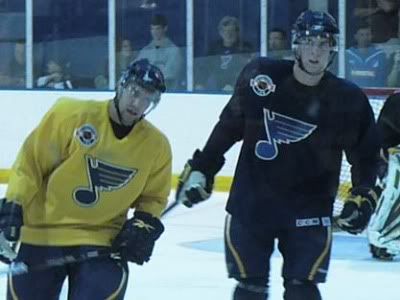 Brett Ponich (R) and fellow pospect Ian Schultz skate off after completing a drill at the Blues' 2009 Pro Orientation Camp ('Game Time' photo by Brian Weidler)