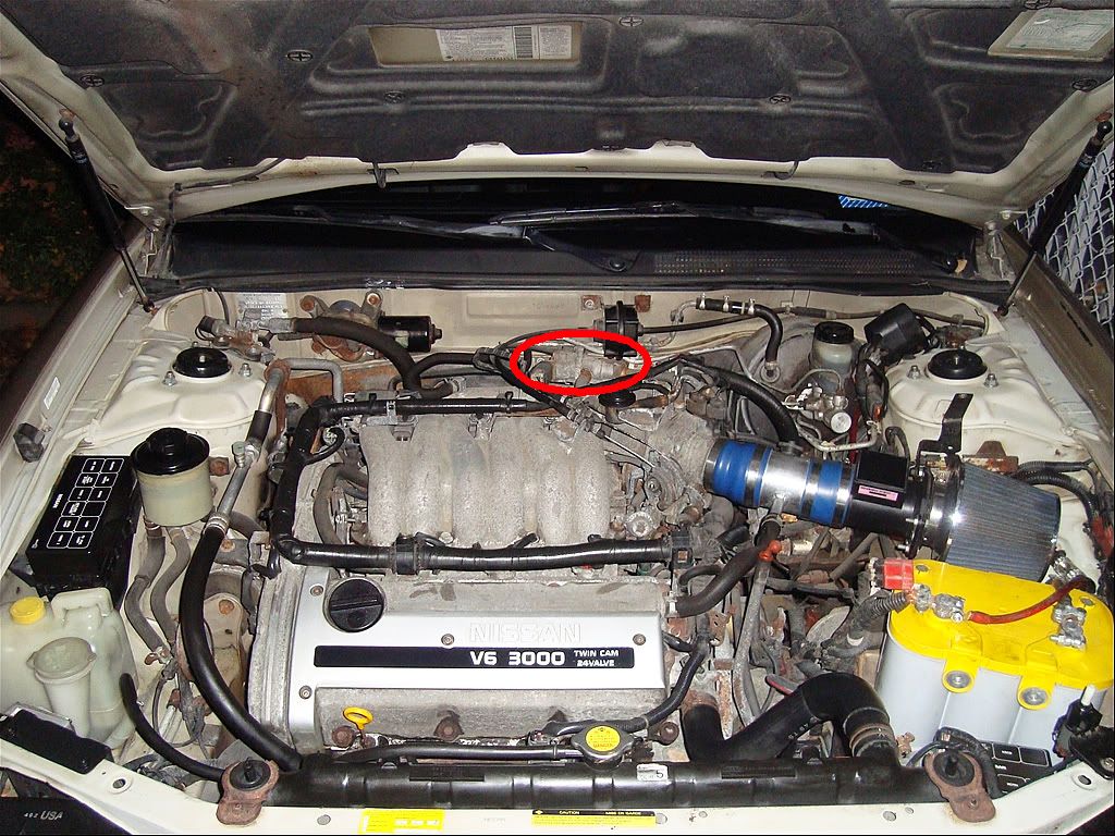 Where is the starter located in a 1996 nissan maxima #2
